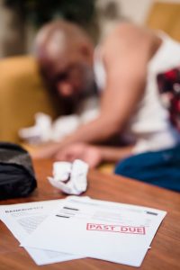 Como quitar dívidas de forma inteligente e rápida
